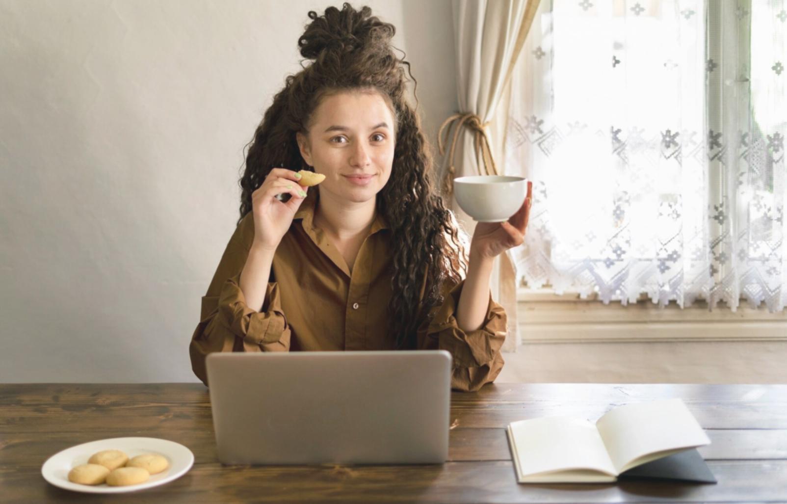 Person reviewing financial documents with focused concentration
